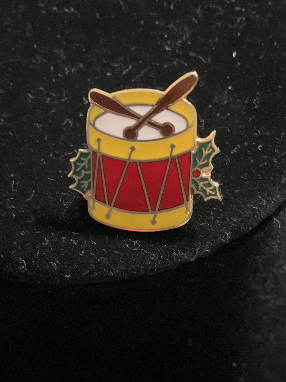 Norcross yellow and Red Drum Enamel Pin with Holly leaves and drum sticks